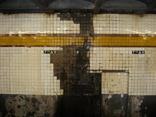 A subway wall in need of repair