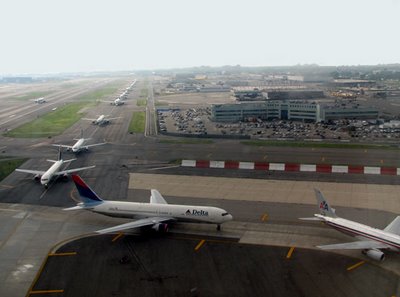 Planes wait in line to take off from JFK