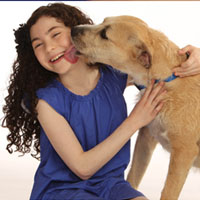 Lilla Crawford and Sunny Dog licking face
