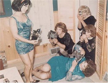 Photo session in the bathroom at casa-susanna in the Catskills casa-susanna is the basis for the Casa Valentina Broadway Show