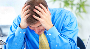 stressed employee at desk