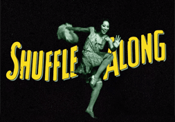 shuffle along black and yellow logo