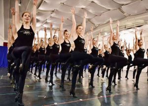 Rockettes in black outfits