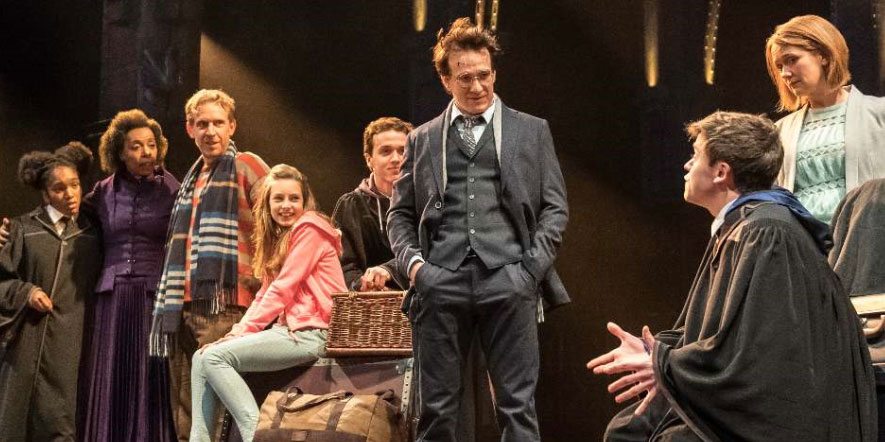 Harry Potter and cast on stage on Broadway